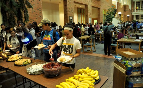photograph of students lining up for the midnight snack table during Wake the Library in May, 2011.