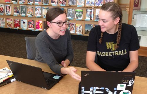 photograph of Kathy Shields assisting student researcher