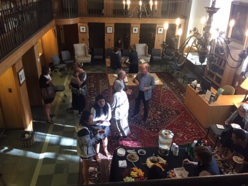 overhead view of library reading room where a reception is being held