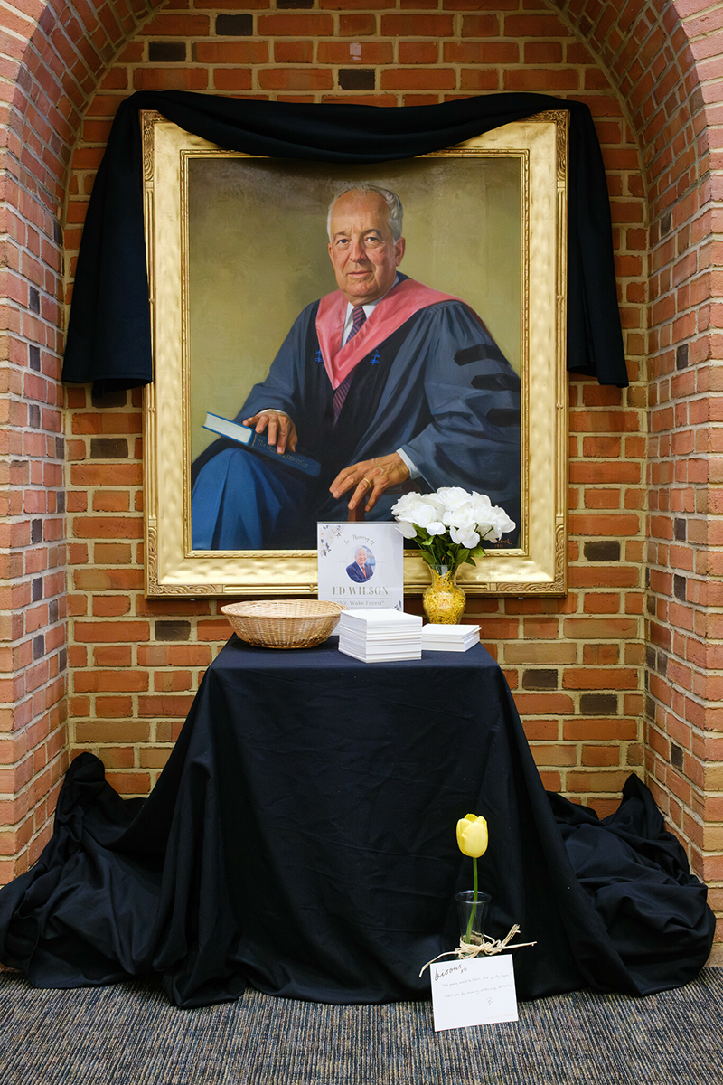 Portrait of Dr. Ed Wilson in ZSR Library, draped in mourning