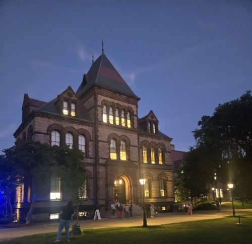 Sayles Hall at night