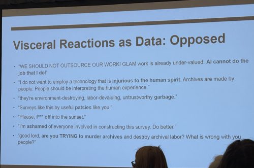 Image of a slide with written responses opposing the use of AI for archival work