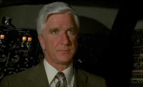 Leslie Nielsen looking stern