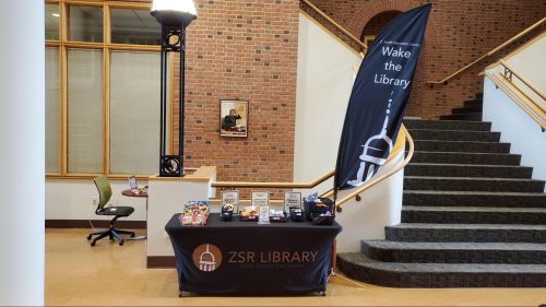 Grab-a-Snack table in the library atrium during Wake the Library