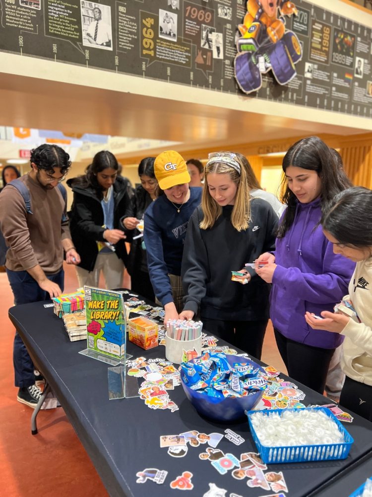 Students take advantage of the exam care kit table as part of Wake the Library